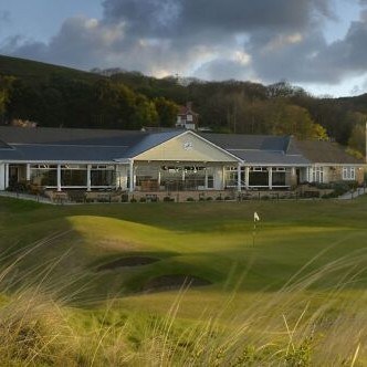 Libbaton Golf Club tee view toward a tree lined fairway