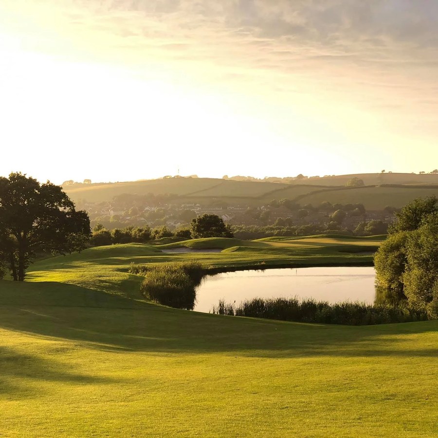 Portmore Golf Park green beside a water hazard in North Devon